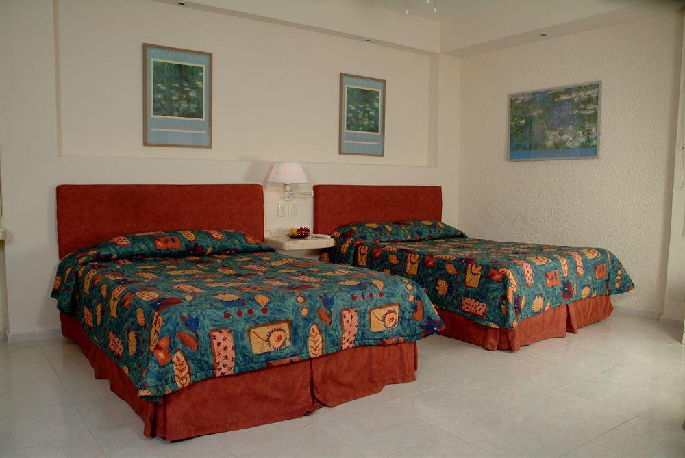 Hotel Y Suites Nader Канкун Экстерьер фото