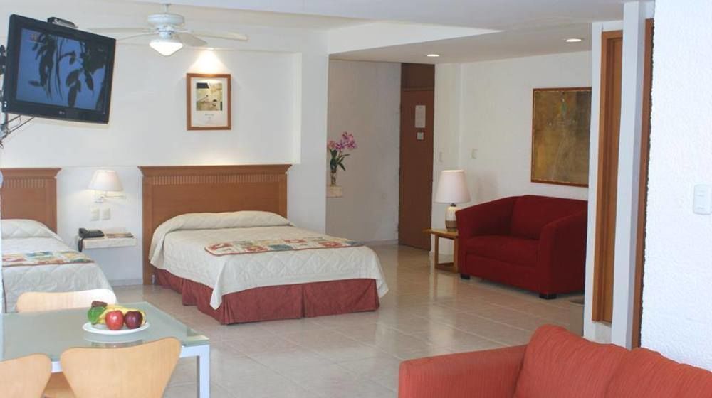 Hotel Y Suites Nader Канкун Экстерьер фото