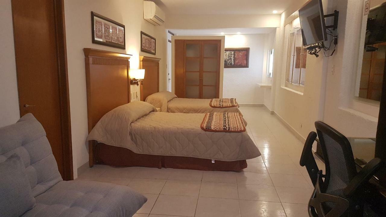 Hotel Y Suites Nader Канкун Экстерьер фото
